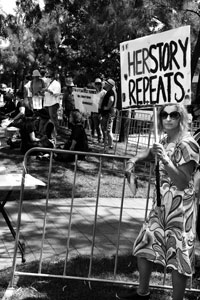 Black and white image of women marching in the Womens Equality March Wagga Wagga